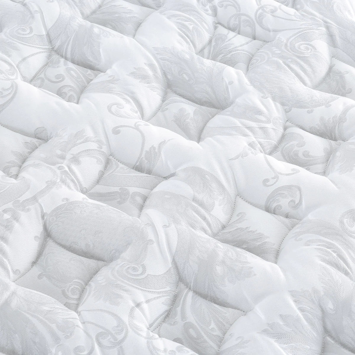 Close-up of a white Sleepyhead mattress with quilted surface