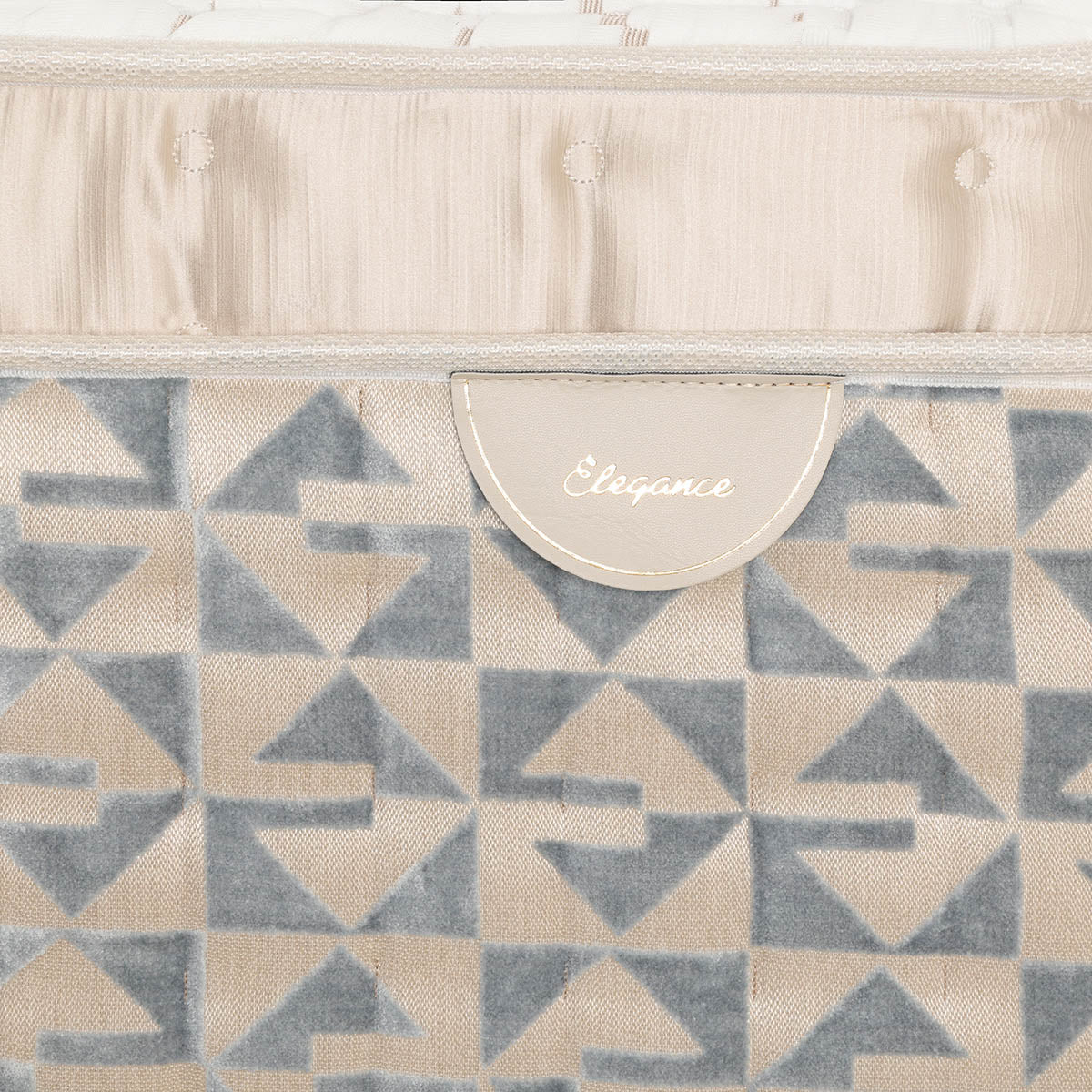 Patterned Sleepyhead mattress border with Elegance label.