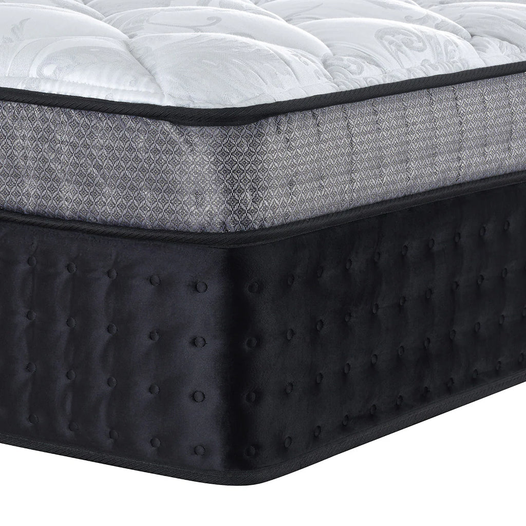 Gray and black Sleepyhead mattress with quilted pattern on a white background
