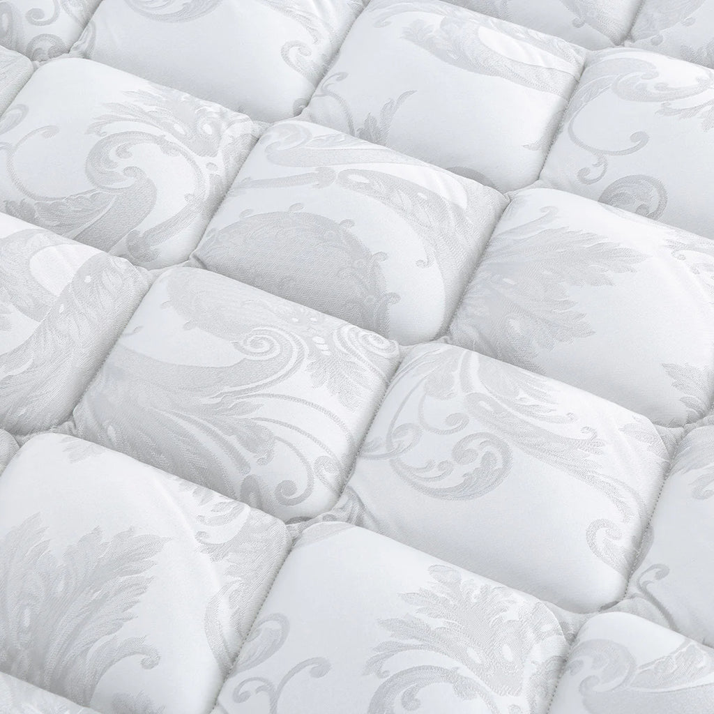 Close-up of a white Sleepyhead mattress with decorative patterns