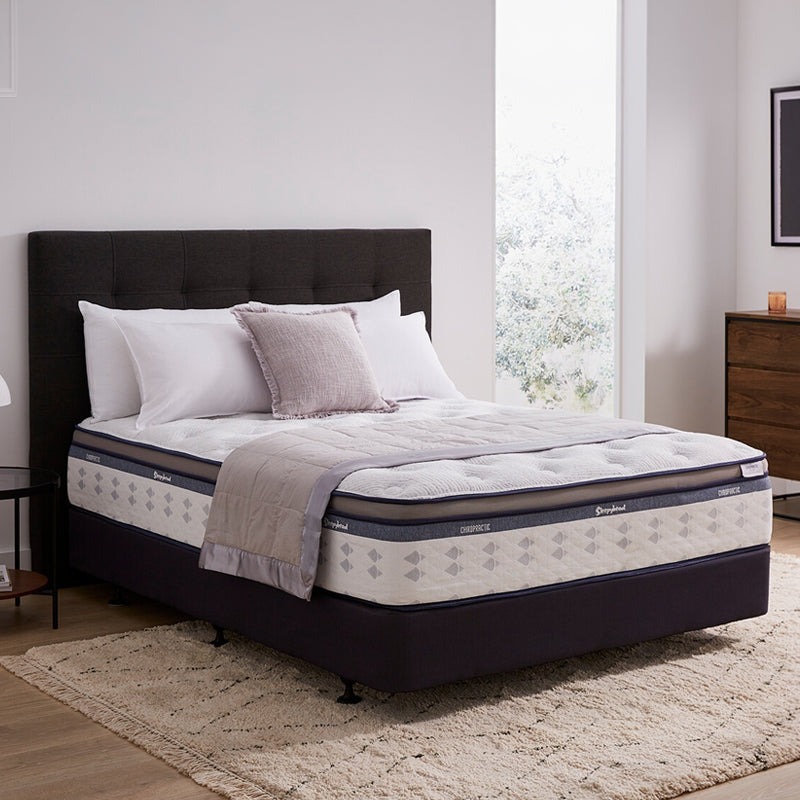 Sleepyhead Chiropractic bed with pillows in a bedroom setting